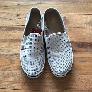 Perforated slip on sneakers
