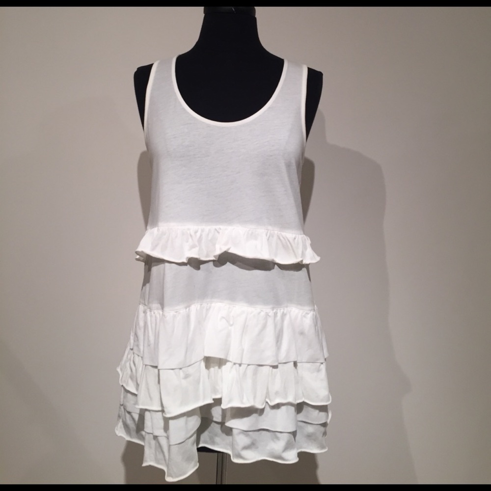 Sleeveless white ruffled top