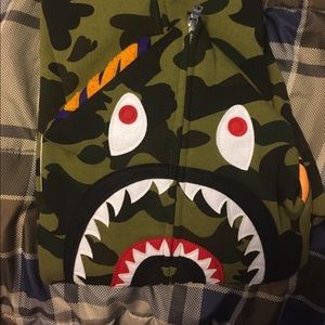 It's a 100% real bape Zip Up jacket 1st Camo green