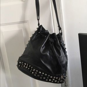 Black leather spiked bucket purse