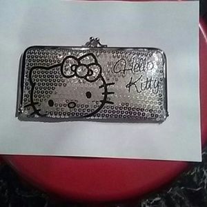 A beautiful,  " Hello Kitty's wallet"