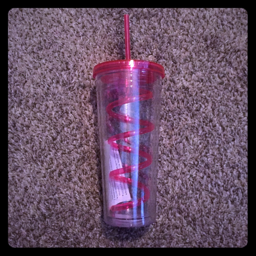 Venti size water coffee bottle with pink straw