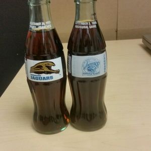 Two 8oz jaguar bottles