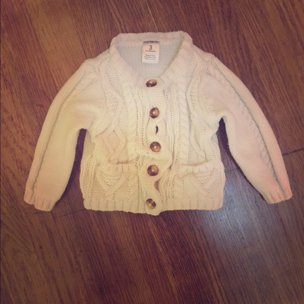 Unisex baby sweater.