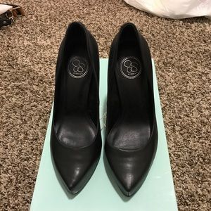 Black leather stiletto pumps