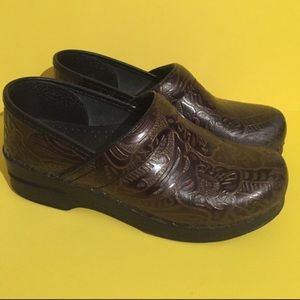 Dansko embossed brown clogs