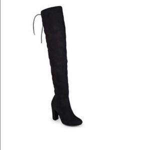 Over the knee heeled black boots