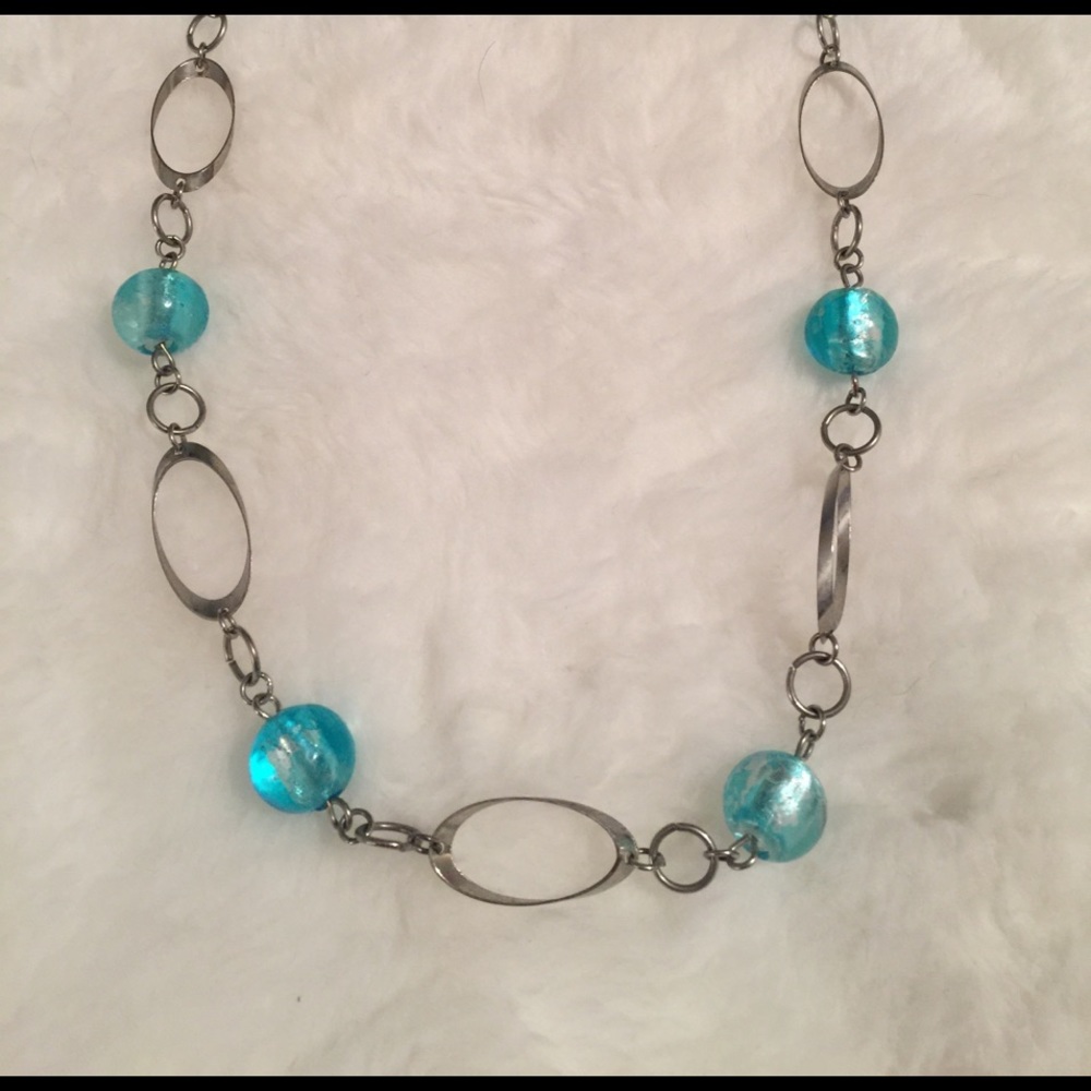 Turquoise and silver colored necklace
