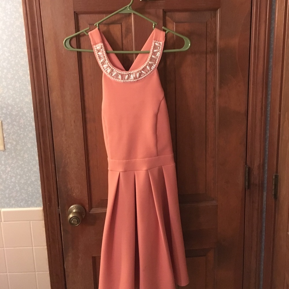 Coral dress with embellished scoop neck. ❤