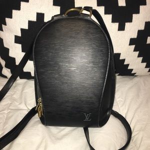 Louis Vuitton black backpack NOT AUTHENTIC