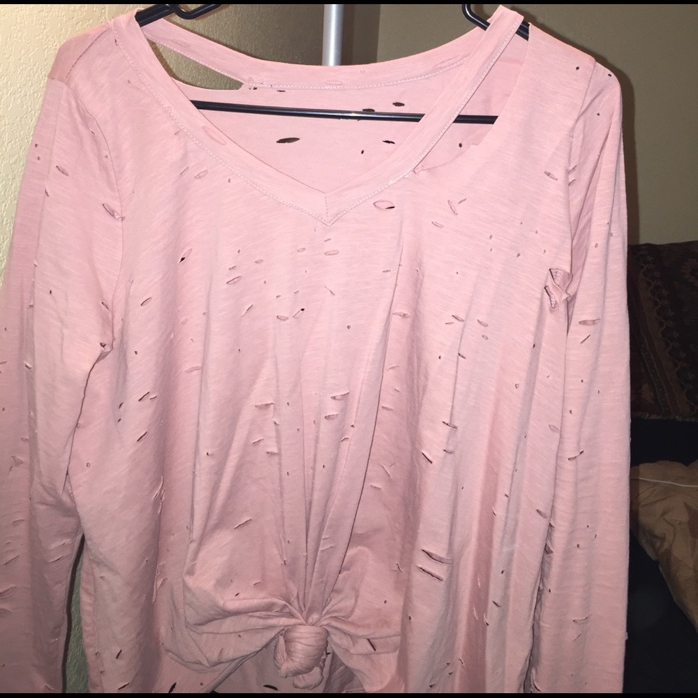 A  cut up knotted sweater
