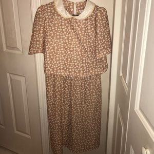 Vintage Dress Brand is "Glamax"