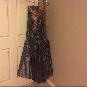 Grey shimmering dress with pink rhinestones