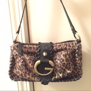 Guess clutch cheetah print with whip stitch