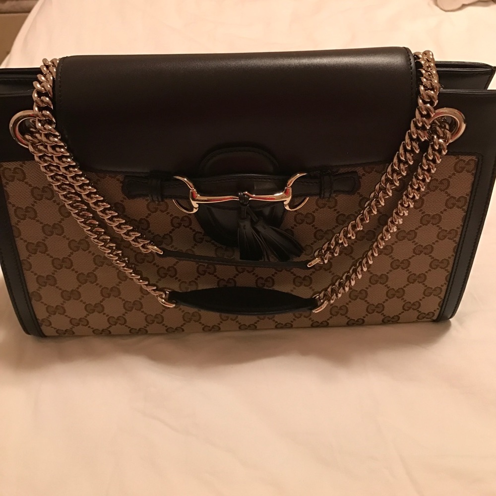 Hand Bag  look new come with dust bag.