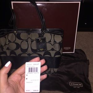 Large black Coach signature print tote