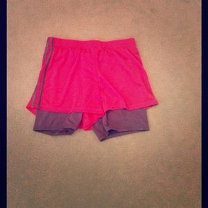 Kids pink and gray Champion shorts.