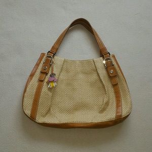 Relic bag, tan straw pattern with brown trim.
