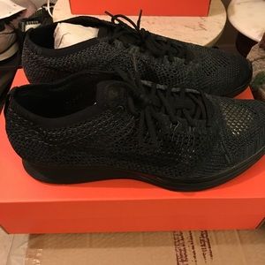 SZ 10.5 brand new triple black flyknit racer