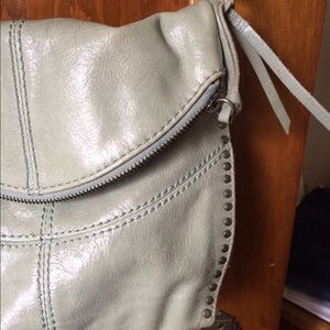 The sak leather purse in sage green