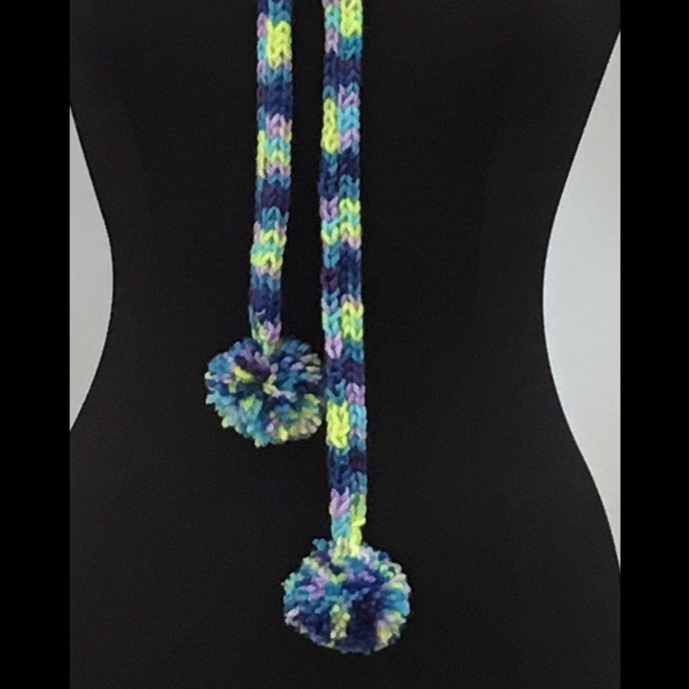 hand knitted necklace with pompoms