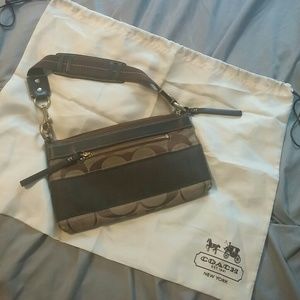 RESERVED. ***** Large Coach wristlet