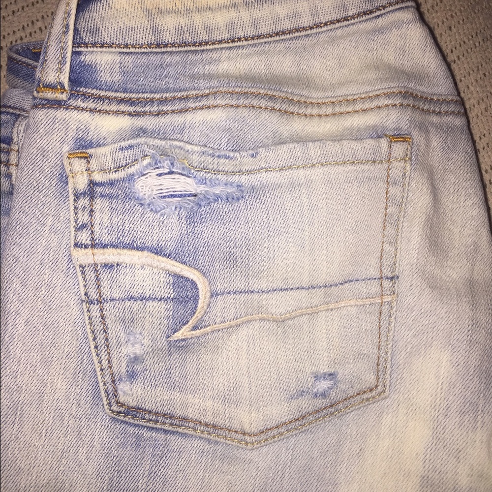 AE hole-y light acid wash jeans