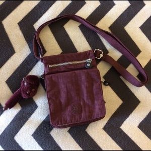 Kipling crossbody maroon bag
