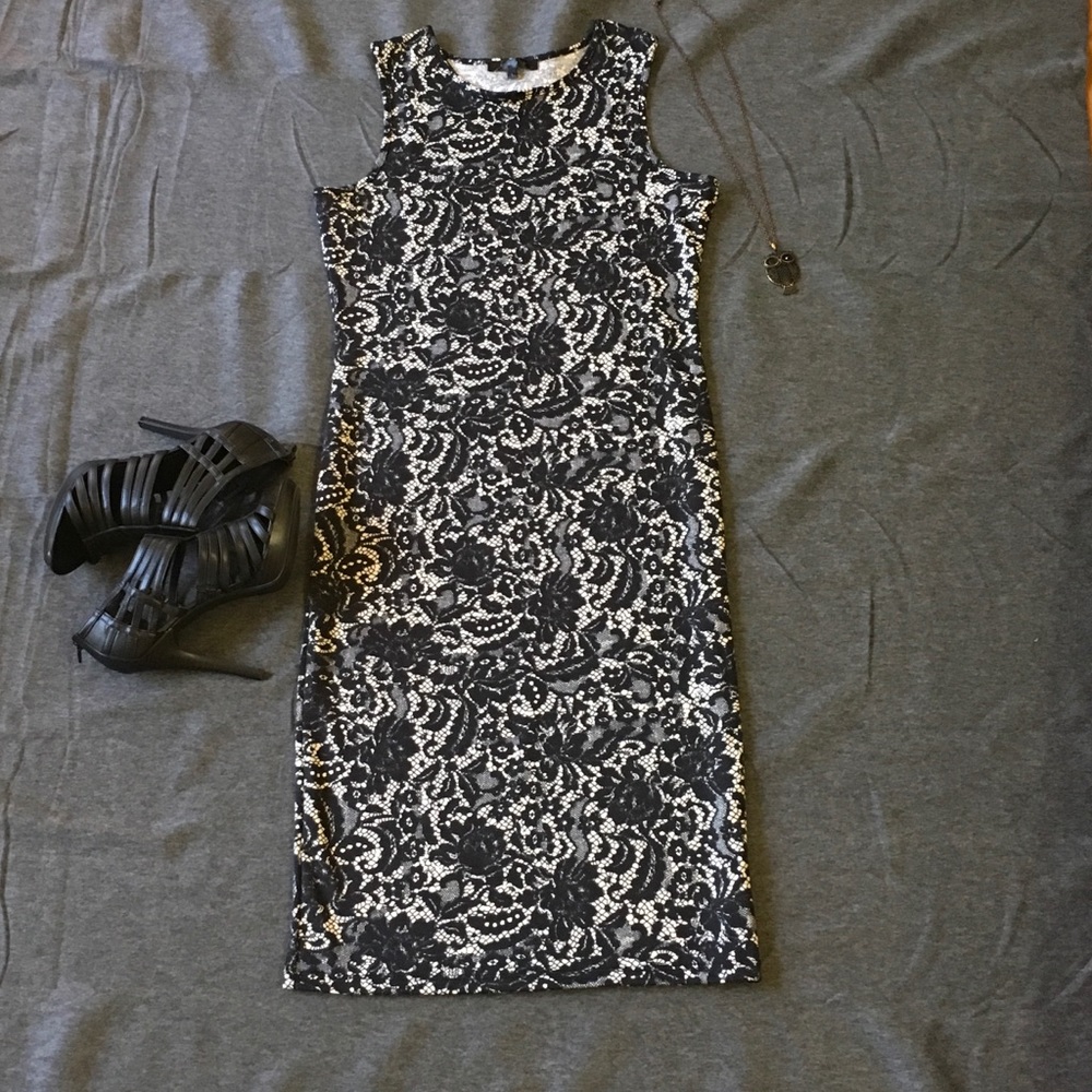 Body-con lace print midi dress.