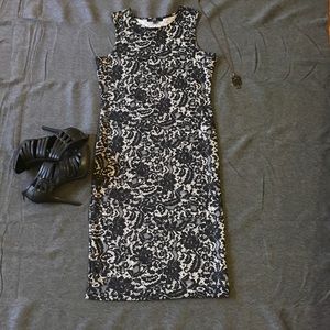 Body-con lace print midi dress.