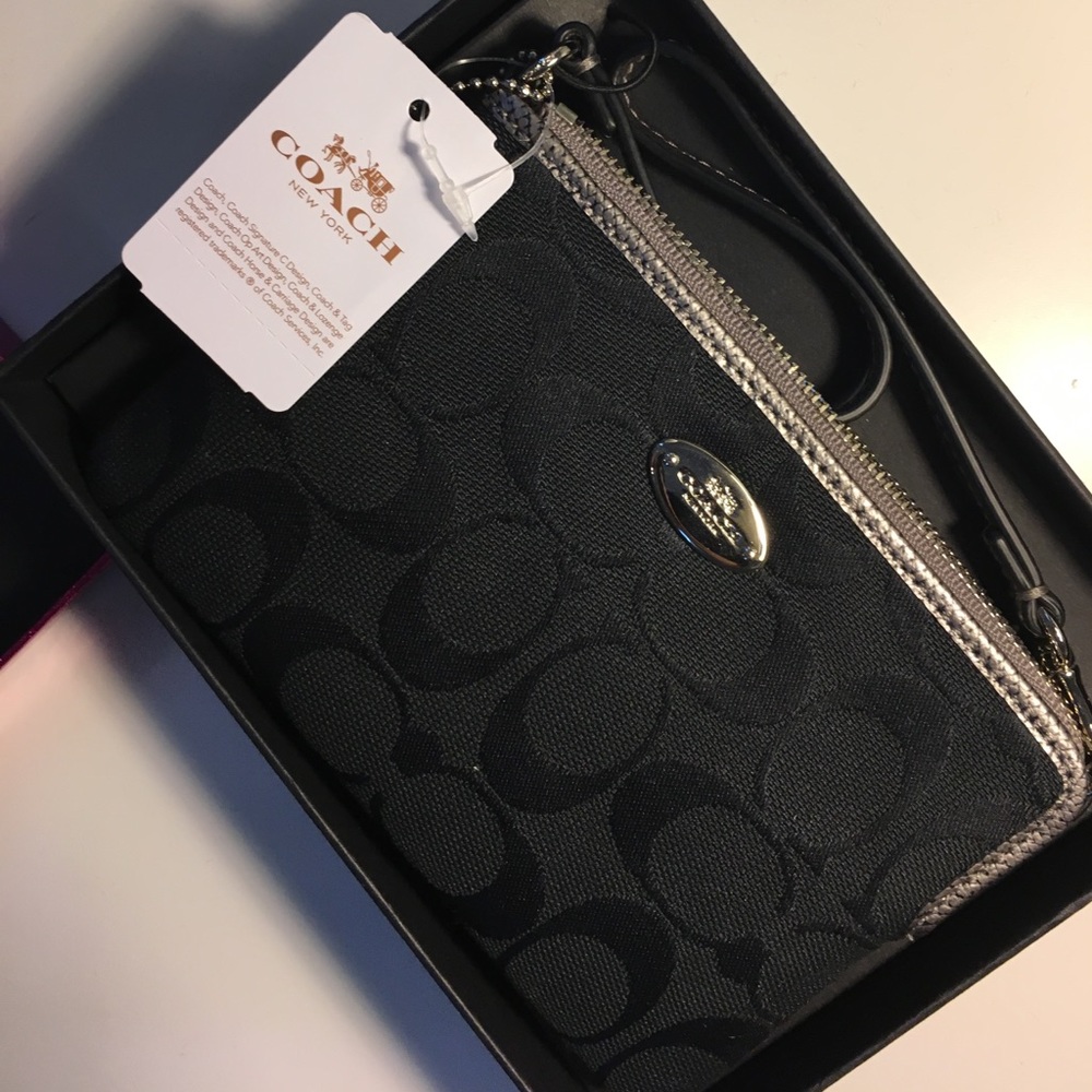 Brand new Coach wristlet