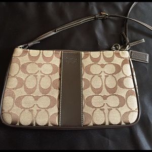 Coach brown/tan Crossbody purse. F3J-6338