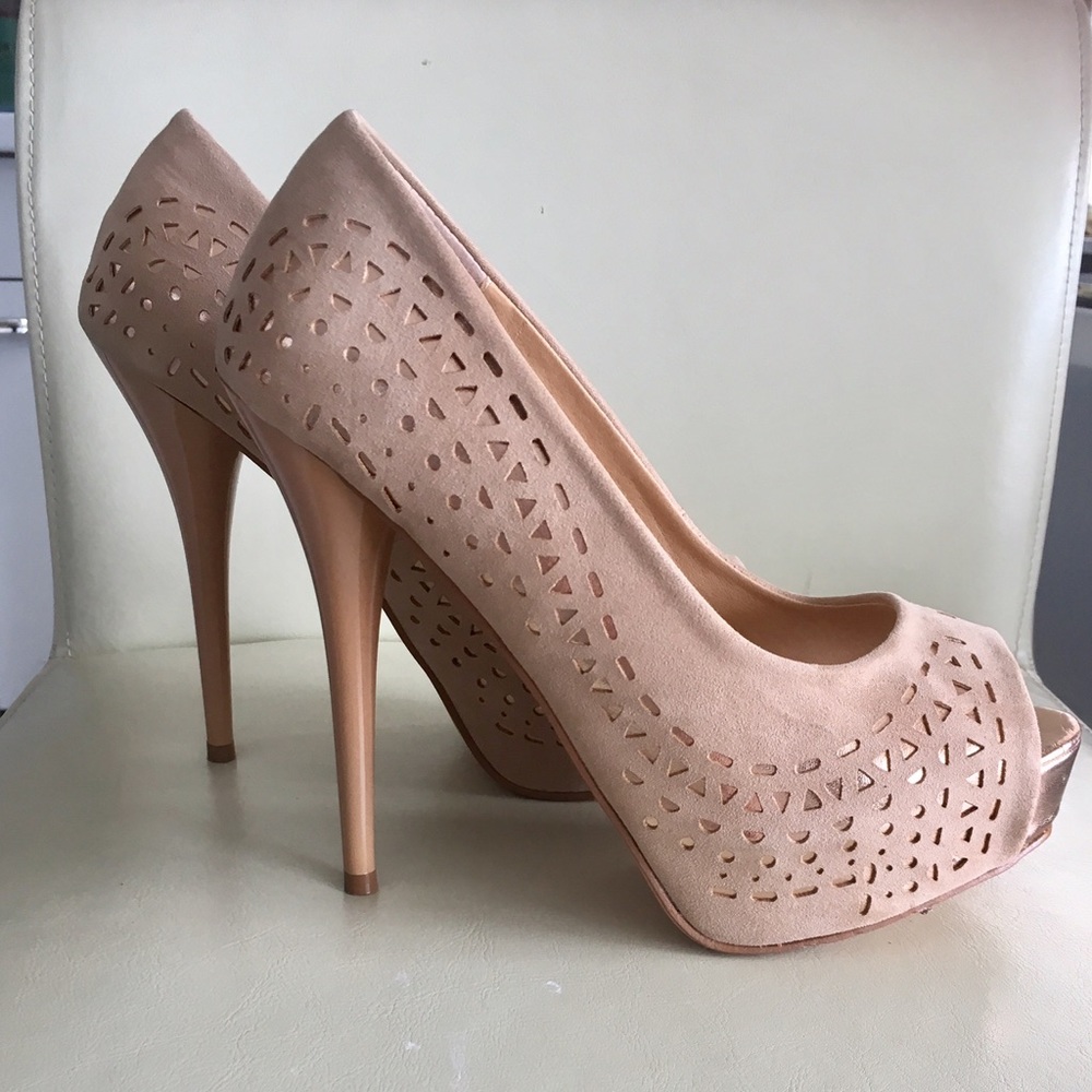 Brand New. Never worn heels Size 8 