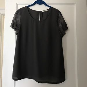 Grey blouse with lace sleeves