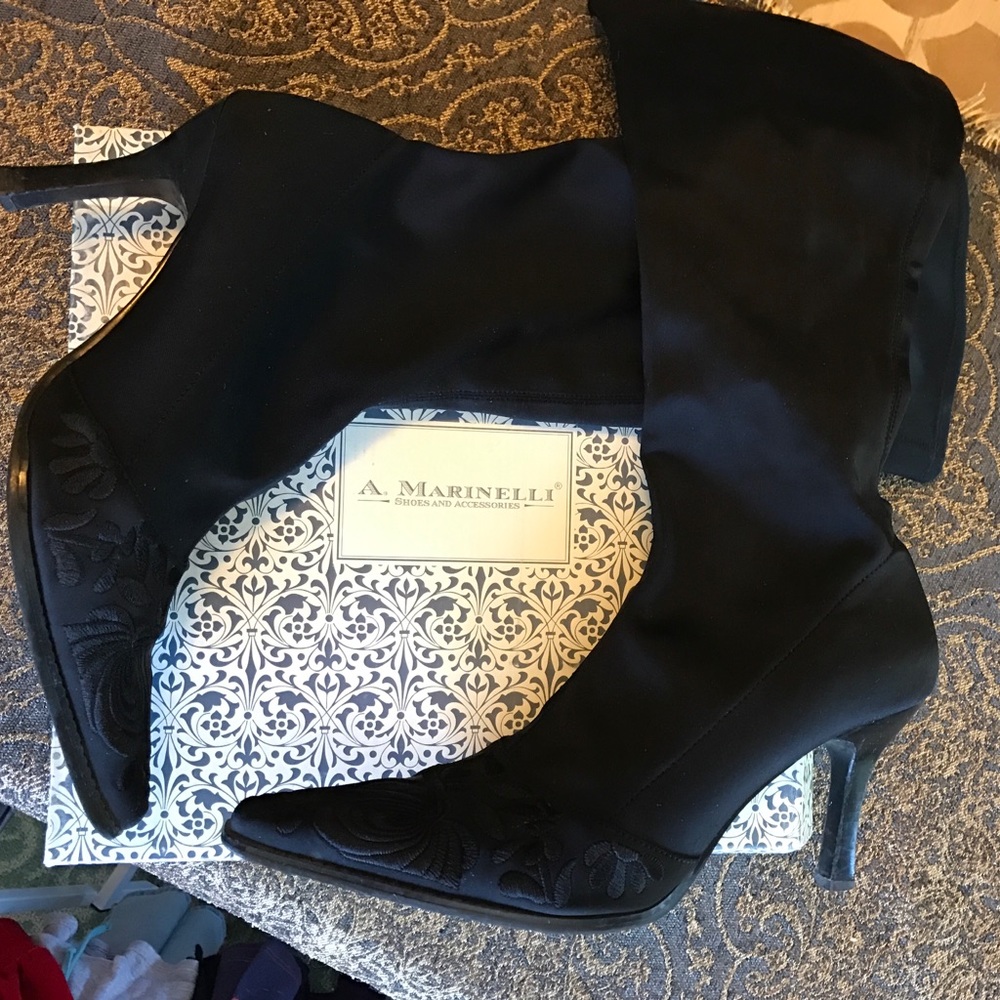 Black Lycra boots with embroidered toe.