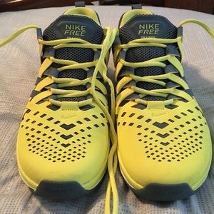 Yellow Nike free workout shoes