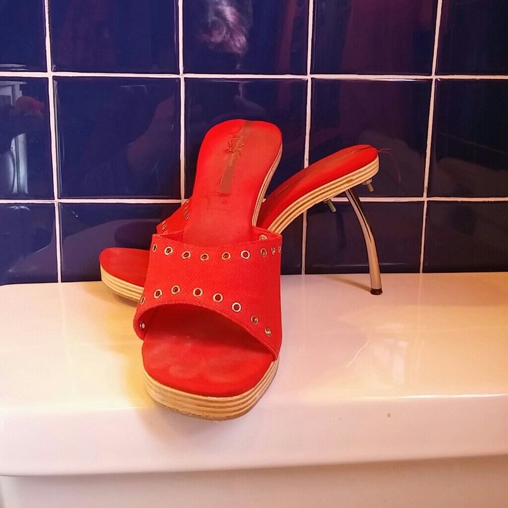 Red denim shoes with silver grommets and heel