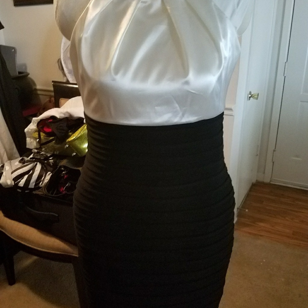 Knee length black and white bandage style dress.