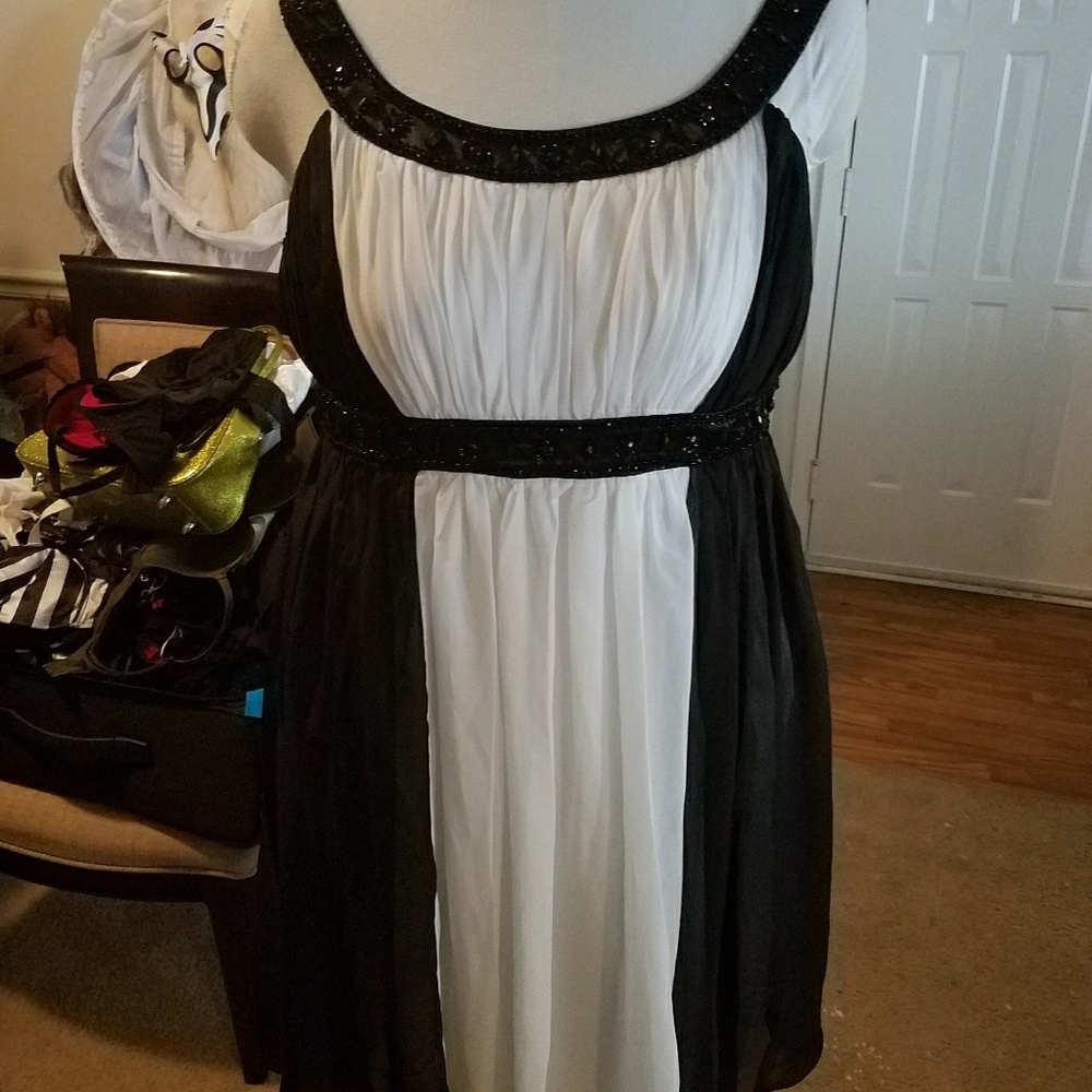 Empire waisted, knee length, flowy evening dress