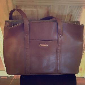 Preowned brown leather bag