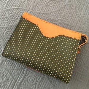 Dooney and Bourke leather makeup/accessory bag.