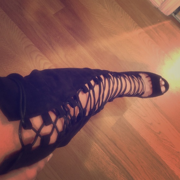 Thigh high lace up boots