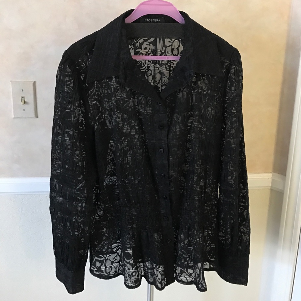 Sheer blouse.