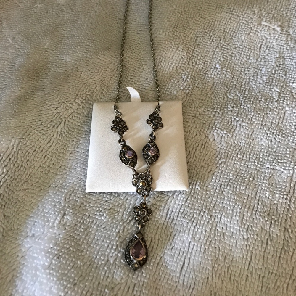 Silver and amethyst necklace.