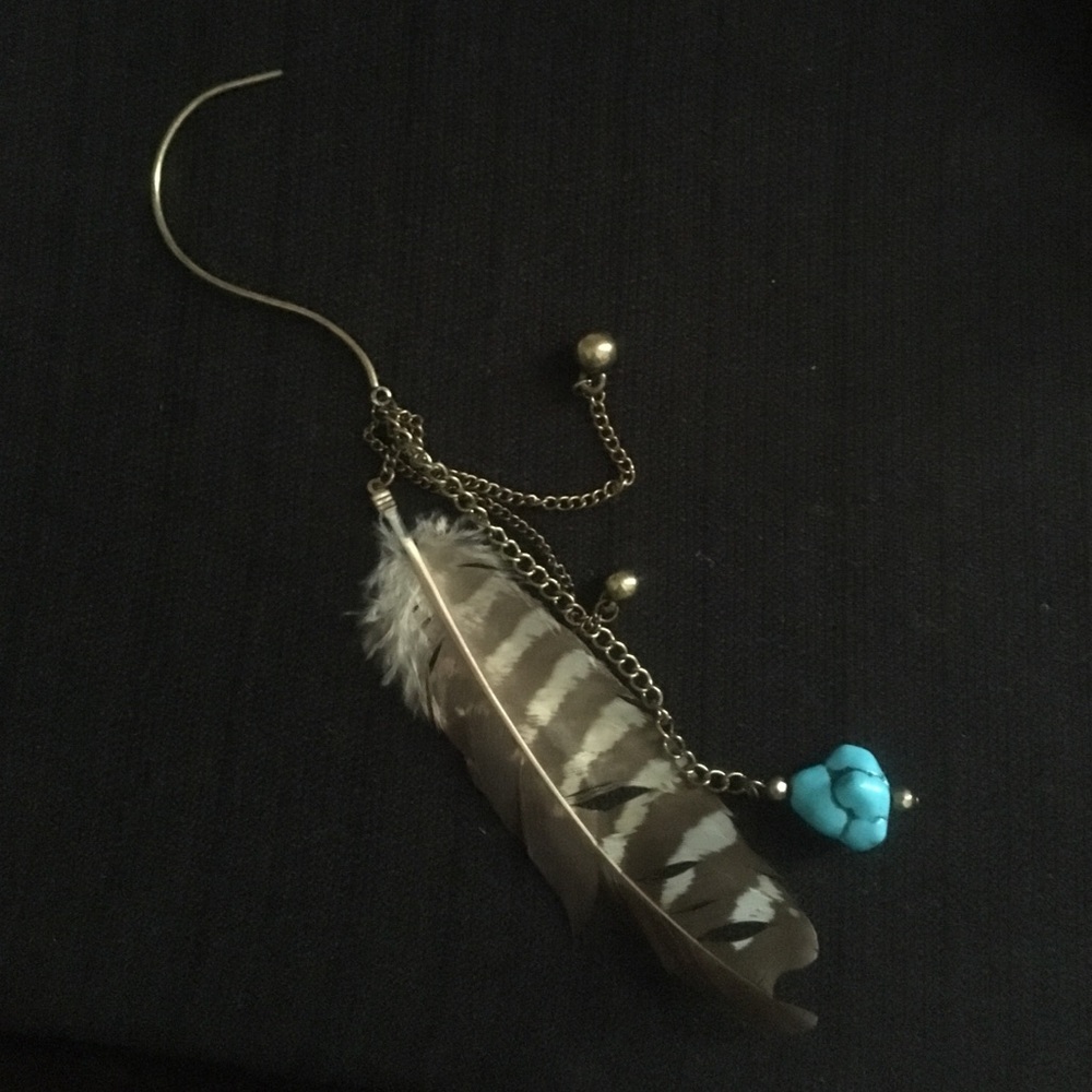 Feather ear cuff with turquoise stone.