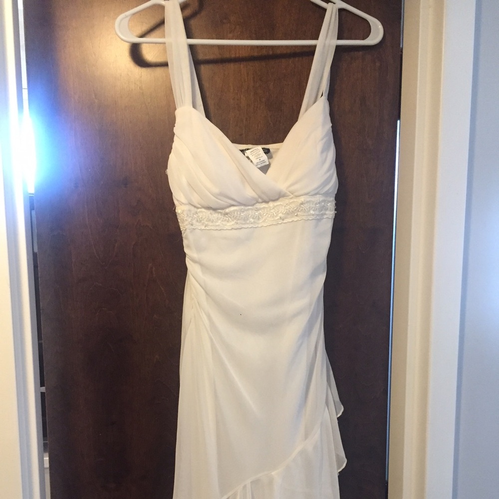White A-length sheer spaghetti strap dress