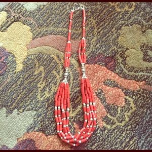 Red coral necklace n Silver ear ring.