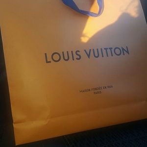 Louis Vuitton shopping bags large and small