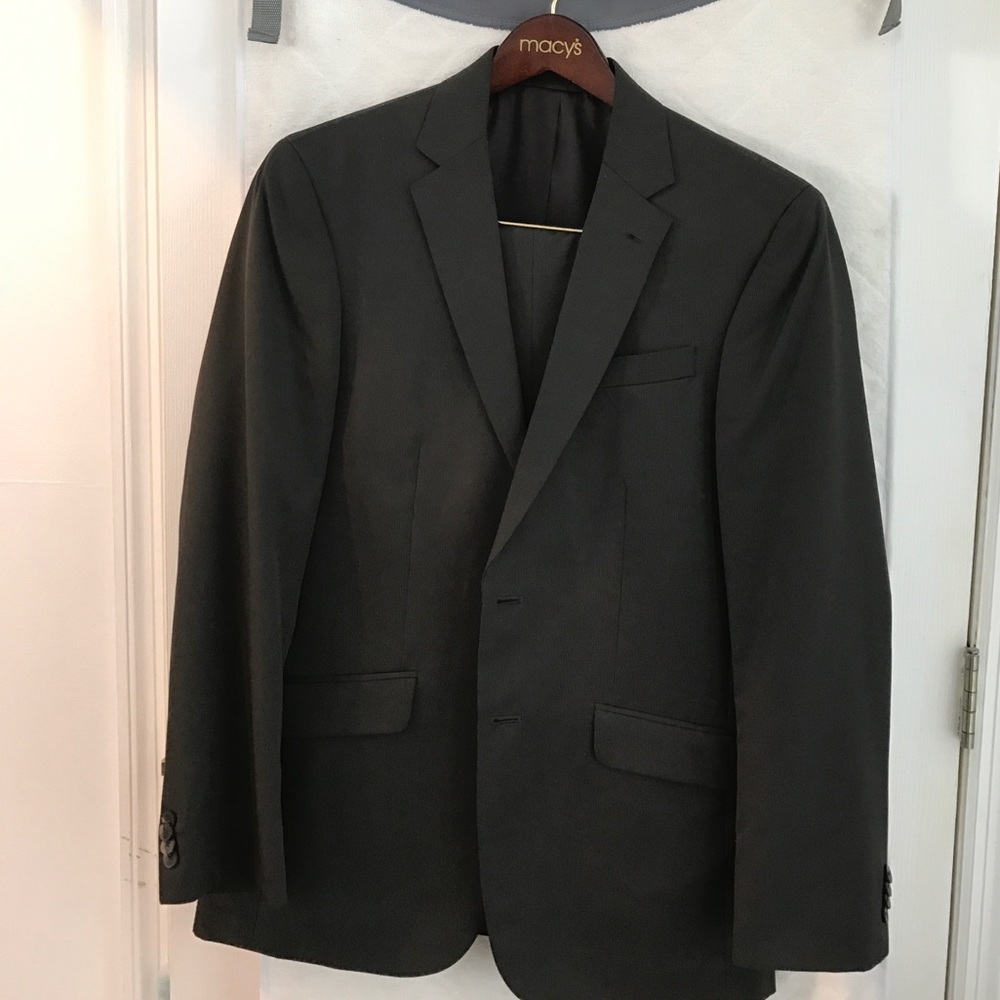 Kenneth Cole suit.