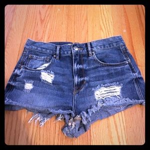 High waisted distressed denim shorts.